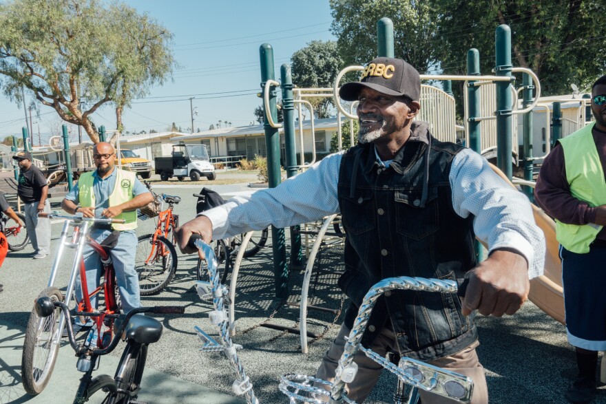 Army veteran Dale Williams with the East Side Riders Bike Club showed his support for The Mission Continues playground beautification project at Gonzaque Village in Watts.