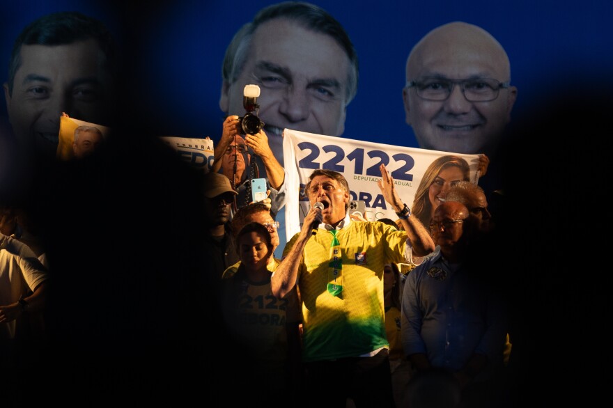 Brazil's President Jair Bolsonaro at a campaign rally in Manaus, capital city of Amazonas state, on Sept. 22. Bolsonaro, a former army captain who has ironically referred to himself as "Captain Chainsaw," views the Amazon as a source of jobs and economic growth and has encouraged people to settle there.