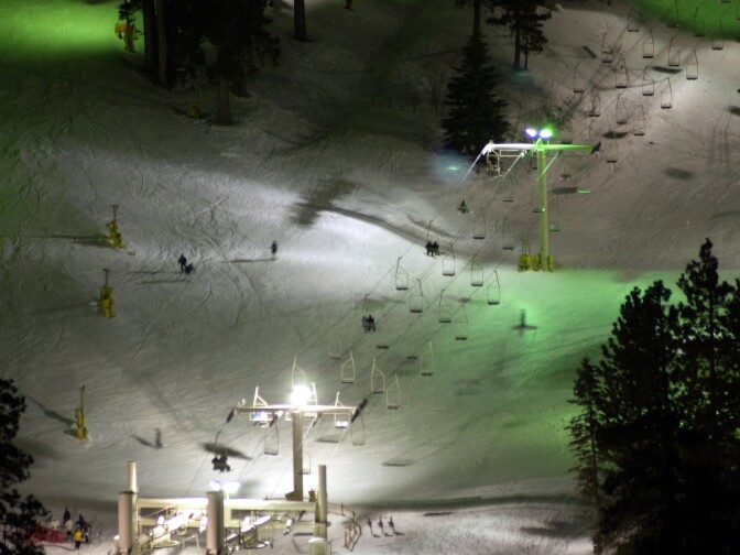 File: Skiers take advantage of well-lit slopes through the night at Mountain High ski resort, Jan. 24, 2001 near Wrightwood, California.