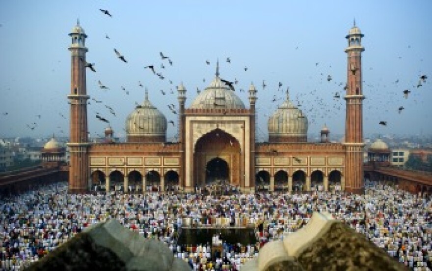 Indian Muslims perform congregational Eid al-Adha morning prayers at the Jama Masjid mosque in New Delhi.