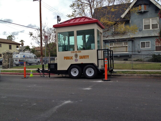 USC public safety officer kiosk, set up at the corner of 27th Street and Raymond Avenue near where the two USC graduate students from China were killed, April 11, 2012.