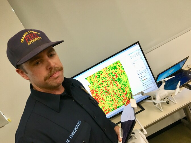 Dave Erikson, of the Orange County Fire Authority, describes a consumer drone outfitted with a specialized camera that detects fire-prone brush.
