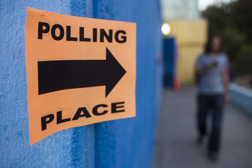 Voters cast their ballots at Echo Park Deep Pool in Los Angeles on Tuesday afternoon, Nov. 8, 2016.