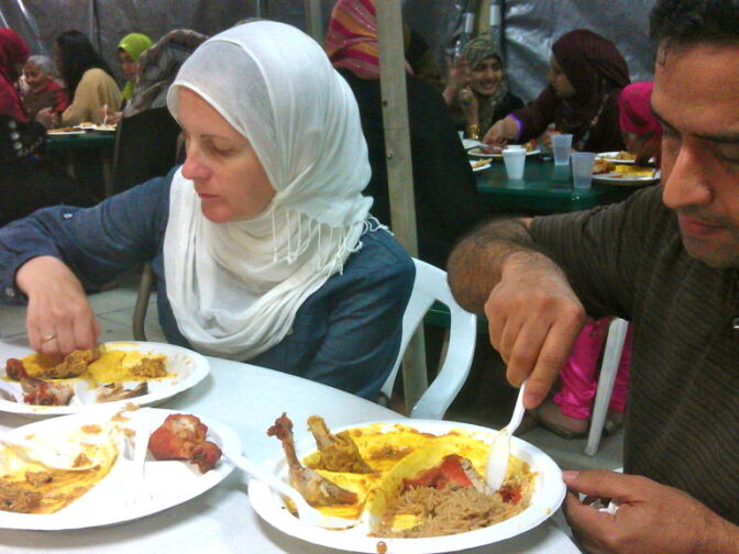 Amy and husband Iqbal finally get to enjoy dinner.