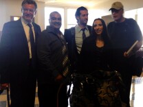 Angel Mendez (second to left) and his wife Jennifer Mendez pose for a picture with their attorneys after a court hearing that awarded them approximately $4 million for a 2010 LA Sheriff's deputy shooting in Lancaster that forced doctors to amputate Angel Mendez' leg. 
