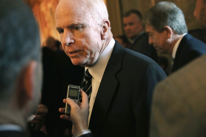 U.S. Sen. John McCain (R-AZ) speaks to members of the media as he arrives for the weekly Senate Republican Policy Committee luncheon September 24, 2013 on Capitol Hill in Washington, DC. Senate Republicans held the luncheon to discuss Senate Republican agendas. 