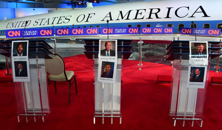 Portraits of candidates are placed on the podium in front Air Force One that flew President Reagan, ahead of today's Republican Presidential Debate at the Ronald Reagan Presidential Library in Simi Valley, California on September 16, 2015. AFP PHOTO /FREDERIC J.BROWN        (Photo credit should read FREDERIC J. BROWN/AFP/Getty Images)