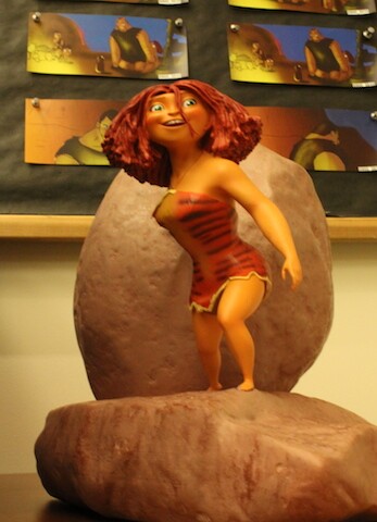 A lifelike model of the character Eep from "The Croods."