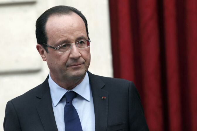 France's President Francois Hollande arrives to deliver a speech on December 21, 2012 at the Elysee Palace, in Paris. 