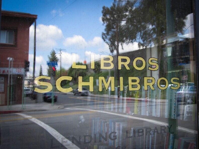 The window to Libros Schmibros, a lending library on the western edge of Boyle Heights.