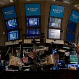 Traders work on the floor of the New York Stock Exchange.