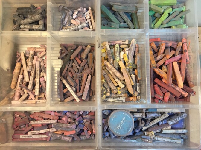 Claire Keane prefers to sketch first in dry pastels before transferring her artwork and ideas to another medium. “You have to work really big,” Keane said. “You can’t get into details because they’re kind of like clunky.” Photo by Erika Aguilar. 
