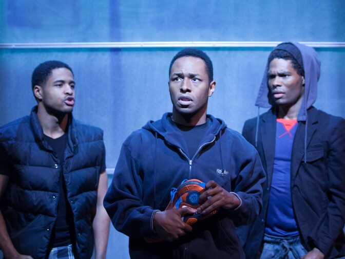 Christian Henley (left), Burl Moseley (center), and Matthew Hancock in a scene showing the latest shoe design.
