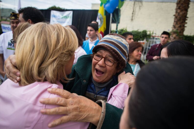 A supporter hugs mayoral candidate Wendy Greuel after she opened her field office in Boyle Heights.