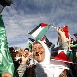 Palestinians celebrate the prisoner swap deal reached between Israel and Hamas outside Ofer prison near the West Bank city of Ramallah on October 18, 2011. Hundreds of people gathered in Ramallah to celebrate the return of prisoners freed under a swap deal with Israel which freed captured Israeli soldier Gilad SHlait after five years of captivity. AFP PHOTO/AHMAD GHARABLI (Photo credit should read AHMAD GHARABLI/AFP/Getty Images)