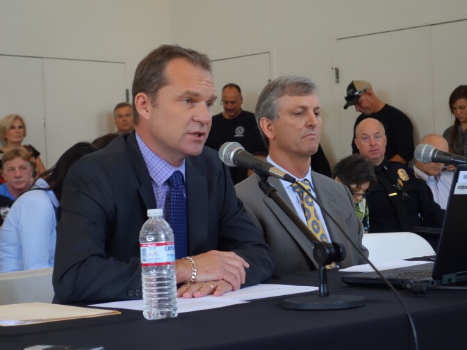 Paul Grigaux a vice president of So. California Edison, describes the July 15 outage that left thousands of Long Beach residents without power. With him at the Long Beach town hall meeting Aug. 22, 2105  is another Edison vice president, Greg Ferree.