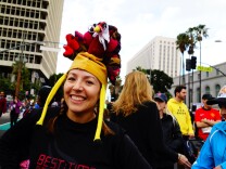 Jazmin Ortega models a turkey hat crafted for her by her sister. Ortega said the legs flapped in her face while running in the Nov. 28, 2013 Turkey Trot LA. in Downtown Los Angeles.