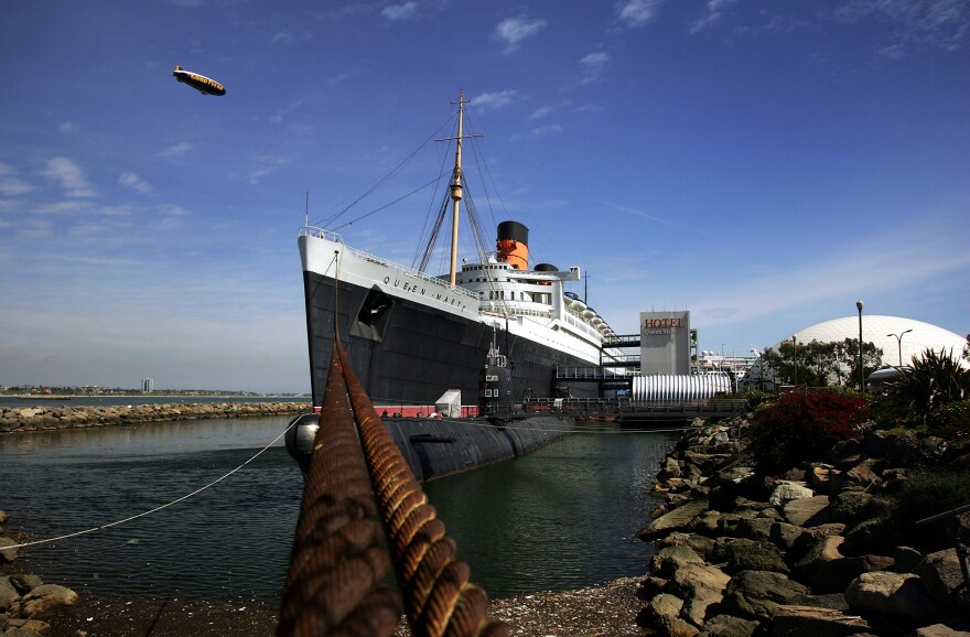 LONG BEACH, CA - MARCH 21:  The Queen Mary, a historic ocean liner that was docked and turned into a tourist attraction 37 years ago, is seen where it still serves as a hotel and exhibit March 21, 2005 in Long Beach, California. The ship's operator, Queen's Seaport Development, filed for Chapter 11 bankruptcy protection March 15, 2005, one day shy of a deadline set by Long Beach for payment of a disputed $3.4 million in back rent.  (Photo by David McNew/Getty Images)