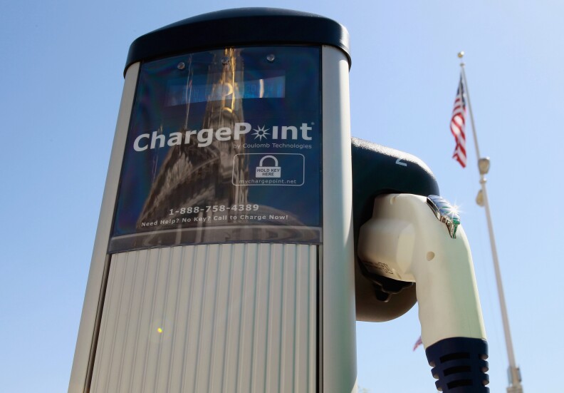 SAN FRANCISCO - AUGUST 25:  A new electric vehicle charging station is seen near San Francisco city hall August 25, 2010 in San Francisco, California. With sales of electric and plug-in hybrid cars expected to increase in the coming years, the Bay Area Air Quality Management District has set aside $5 million to increase the number of electric car charging stations to 5,000 around the Bay Area. There are currently 120 stations in the area.  (Photo by Justin Sullivan/Getty Images)