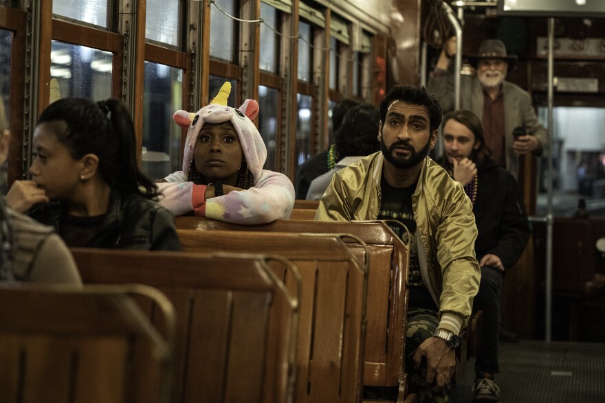 Issa Rae as Leilani, Kumail Nanjiana as Jibran of "The Lovebirds" from NETFLIX.
