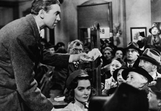 Actor Jimmy Stewart, shown with Donna Reed, in a still from the 1946 film It's A Wonderful Life, directed by Frank Capra.
