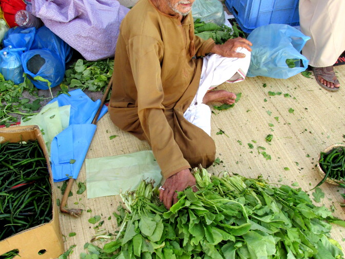 Vegetable dealer in Nizwa souk