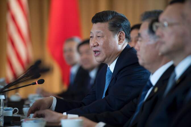 Chinese President Xi Jinping (C) speaks during an expanded bilateral meeting with US President Donald Trump at the Mar-a-Lago estate in West Palm Beach, Florida, April 7, 2017. / AFP PHOTO / JIM WATSON        (Photo credit should read JIM WATSON/AFP/Getty Images)