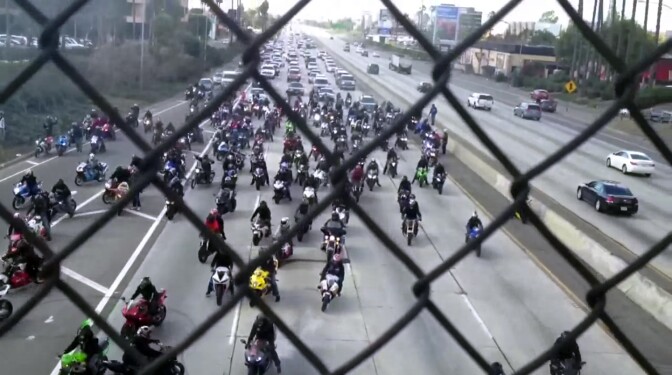 Bikers block traffic on Interstate 10 for a marriage proposal Sunday, Jan. 27, 2013.