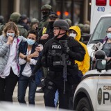 BOULDER, CO - MARCH 22: (EDITOR'S NOTE: Alternate crop) Healthcare workers walk out of a King Sooper's Grocery store after a gunman opened fire on March 22, 2021 in Boulder, Colorado. Dozens of police responded to the afternoon shooting in which at least one witness described three people who appeared to be wounded, according to published reports.  (Photo by Chet Strange/Getty Images))