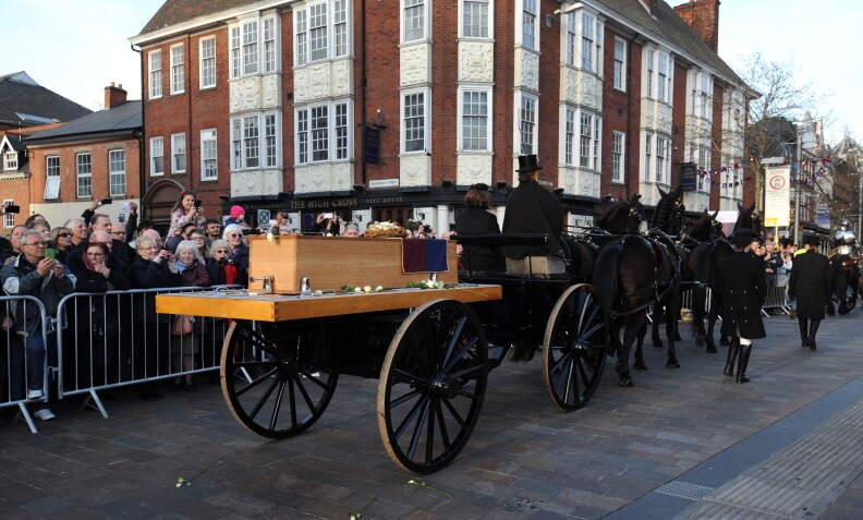 The coffin containing the remains of King Richard III is carried by gun carriage as it processes through Leicester City centre ahead of internment at Leicester Cathedral in Leicester, England, Sunday, March 22, 2015. The skeleton of King Richard III was discovered in 2012 in the foundations of Greyfriars Church, Leicester, 500 years after he was killed in the Battle of Bosworth Field. Richard III’s casket will lie inside Leicester Cathedral for public viewing for three days until 26 March when he will be re-interred during a service. (AP Photo/Rui Vieira)