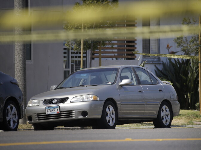 UCLA gunman Mainak Sarkar's vehicle is parked on the street, Friday, June 3, 2016, in Los Angeles. The former UCLA graduate student killed a woman in Minnesota before carrying two semi-automatic pistols and a grudge back to Los Angeles, where he fatally shot the young professor on Wednesday he once called a mentor and then killed himself.