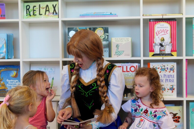 As the Ice Princess, Michele reads to her young clients at a gig in Santa Monica.
