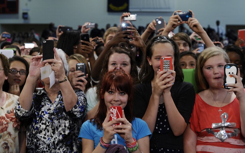 Teachers and students listen to US President Barack Obama at Mooresville Middle School in Mooresville, North Carolina, on June 6, 2013. Obama arrived in North Carolina as part of his Middle Class Jobs & Opportunity Tour.  AFP PHOTO/Jewel Samad        (Photo credit should read JEWEL SAMAD/AFP/Getty Images)
