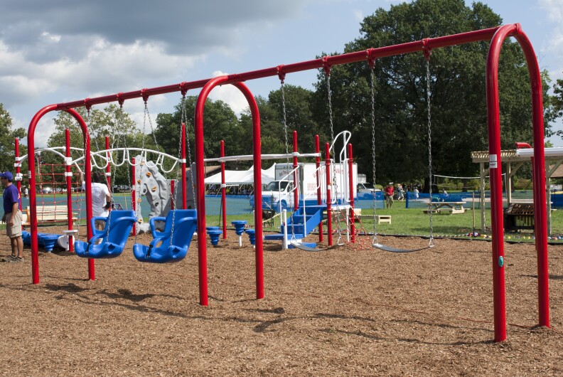 Children of military families at Fort Meade, Md., received a new playground Sept. 10, 2011, thanks to the effort of hundreds of volunteers from Northrop Grumman, the Fort Meade Community Covenant Council and KaBOOM!, a non-profit organization dedicated to saving play. U.S. Defense Secretary Leon Panetta joined the effort, which was part of the 9/11 Day of Service and Remembrance.