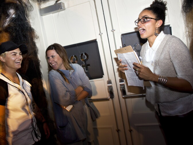 Savannah Wood, right, plays a demented women’s studies tour guide. Wood takes Leah Perloff, left, and a group through KillJoy's Kastle: A Lesbian Feminist Haunted House. 