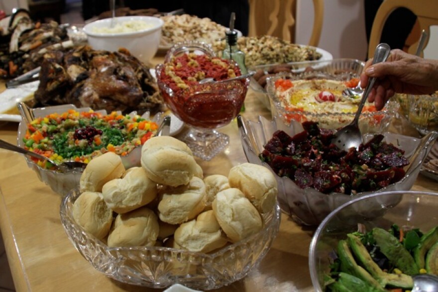 This table has a mix of "traditional" American Thanksgiving foods and some Arabic additions.