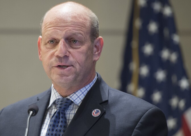 US Citizenship and Immigration Services Director Leon Rodriguez speaks after administering the citizenship oath to people becoming US citizens during a naturalization ceremony at the US Patent and Trademark Office in Alexandria, Virginia, May 28, 2015. AFP PHOTO / SAUL LOEB        (Photo credit should read SAUL LOEB/AFP/Getty Images)
