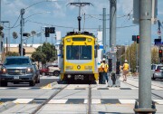 FILE: An Expo Line test train runs through downtown Santa Monica. The train is expected to open to the public in spring 2016.