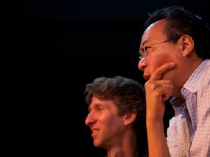 Cellist Yo-Yo Ma and dancer Damian Woetzel watch a class exercise during a performance for students at Inner City Arts in downtown Los Angeles on April 5, 2011.