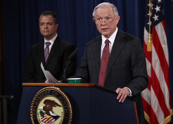 WASHINGTON, DC - MARCH 02:  U.S. Attorney General Jeff Sessions (R) answers questions during a press conference at the Department of Justice on March 2, 2017 in Washington, DC. Sessions addressed the calls for him to recuse himself from Russia investigations after reports surfaced of meetings he had with the Russian ambassador during the U.S. presidential campaign. Also pictured is Sessions' Chief of Staff Jody Hunt (L).  (Photo by Win McNamee/Getty Images)