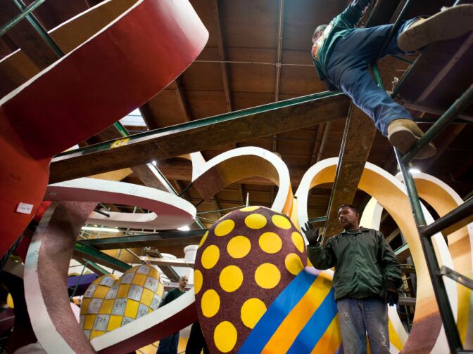 Phoenix Decorating Company employees place beams over the Donate Life float, in preparation for adding color to the float. The 41 floats can also be viewed after the parade on Sierra Madre Boulevard on New Year's Day and Jan. 2.