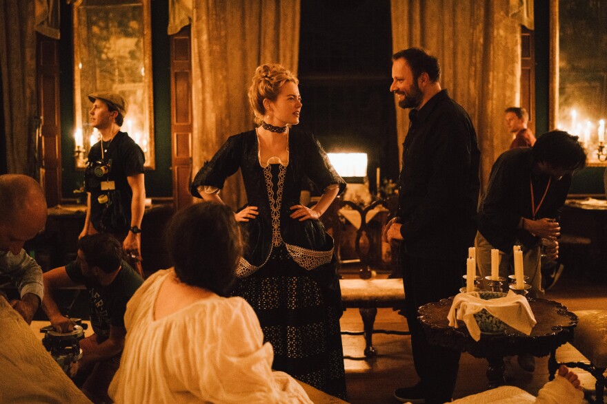 Emma Stone and Director Yorgos Lanthimos on the set of THE FAVOURITE. Photo by Atsushi Nishijima. © 2018 Twentieth Century Fox Film Corporation All Rights Reserved