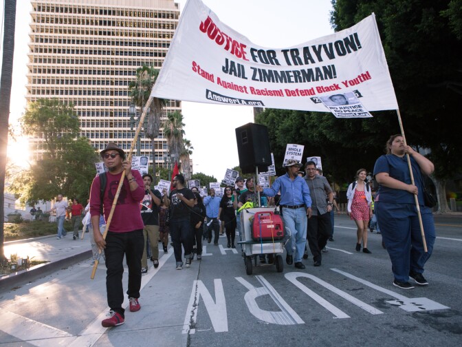 Hundreds of protesters march through downtown Los Angeles on July 16th, 2013 in response to the George Zimmerman case verdict.