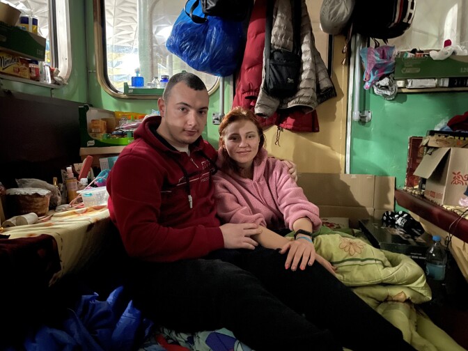 Artem Omelechenko, 26, and Nastya Lukashova, 23, have been living inside a rail car in the Zahkysynkiv Ukrainy station in the Kharkiv metro. They say they covered the car's windows because the platform's lights stay on 24/7.