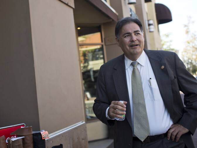 Santa Ana City Manager David Cavazos walks down Fourth Street in downtown Santa Ana, also known as Calle Cuatro, on Wednesday, Jan. 14.
