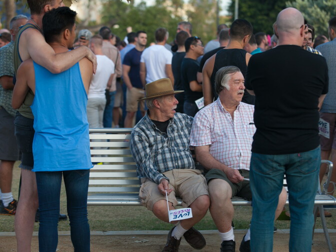 Brad Keistler and Ron Cree rest on a bench during the Decision Day Rally in West Hollywood Park to celebrate the U.S Supreme Court decision on marriage on Friday, June 26, 2015.