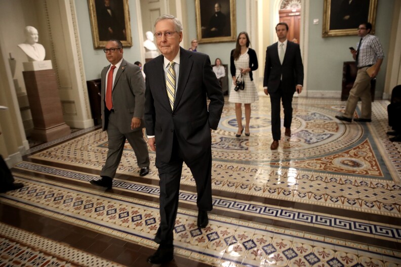 WASHINGTON, DC - JULY 13:  Senate Majority Leader Mitch McConnell (R-KY) walks to a meeting of Republican senators where a new version of their healthcare bill was scheduled to be released at the U.S. Capitol July 13, 2017 in Washington, DC. The latest version of the proposed bill aims to repeal and replace the Affordable Care Act, also knows as Obamacare. (Photo by Win McNamee/Getty Images)