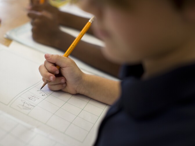 Kindergartner Gemma Gomez takes part in a writing exercise in Mandarin at Eugene Field Elementary, a Mandarin immersion school in Pasadena, on Thursday morning, May 28, 2015. Mother Brooke Gomez had some anxiety about her child learning in a language that her family doesn't speak at home.