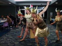 Fans of "The Big Lebowski" dress up and reenact a scene from the movie on Saturday, September 24, 2013.