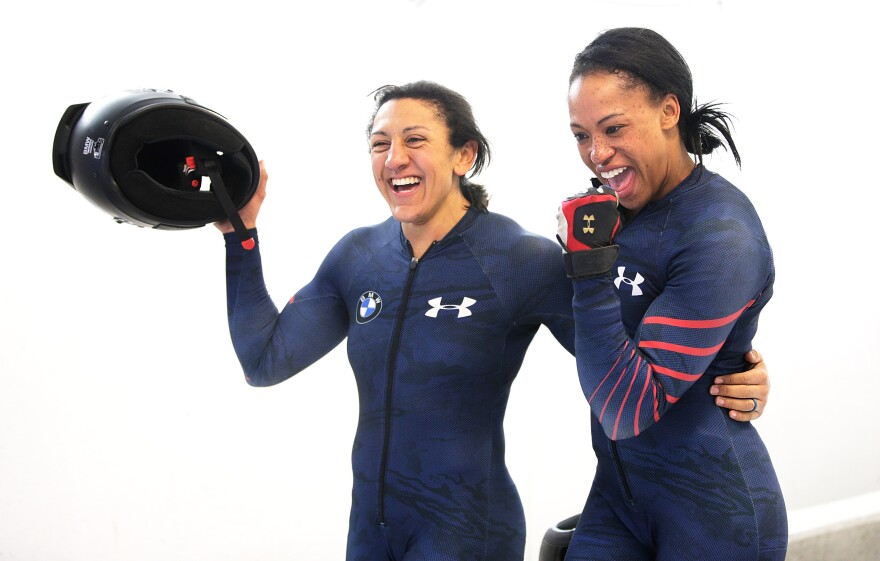 INNSBRUCK, AUSTRIA - FEBRUARY 13:  Elana Meyers Taylor and Lauren Gibbs of the USA celebrate third place after their fourth run in the Women's Bobsleigh during Day 2 of the IBSF World Championships for Bob and Skeleton at Olympiabobbahn Igls on February 13, 2016 in Innsbruck, Austria.  (Photo by Adam Pretty/Bongarts/Getty Images)